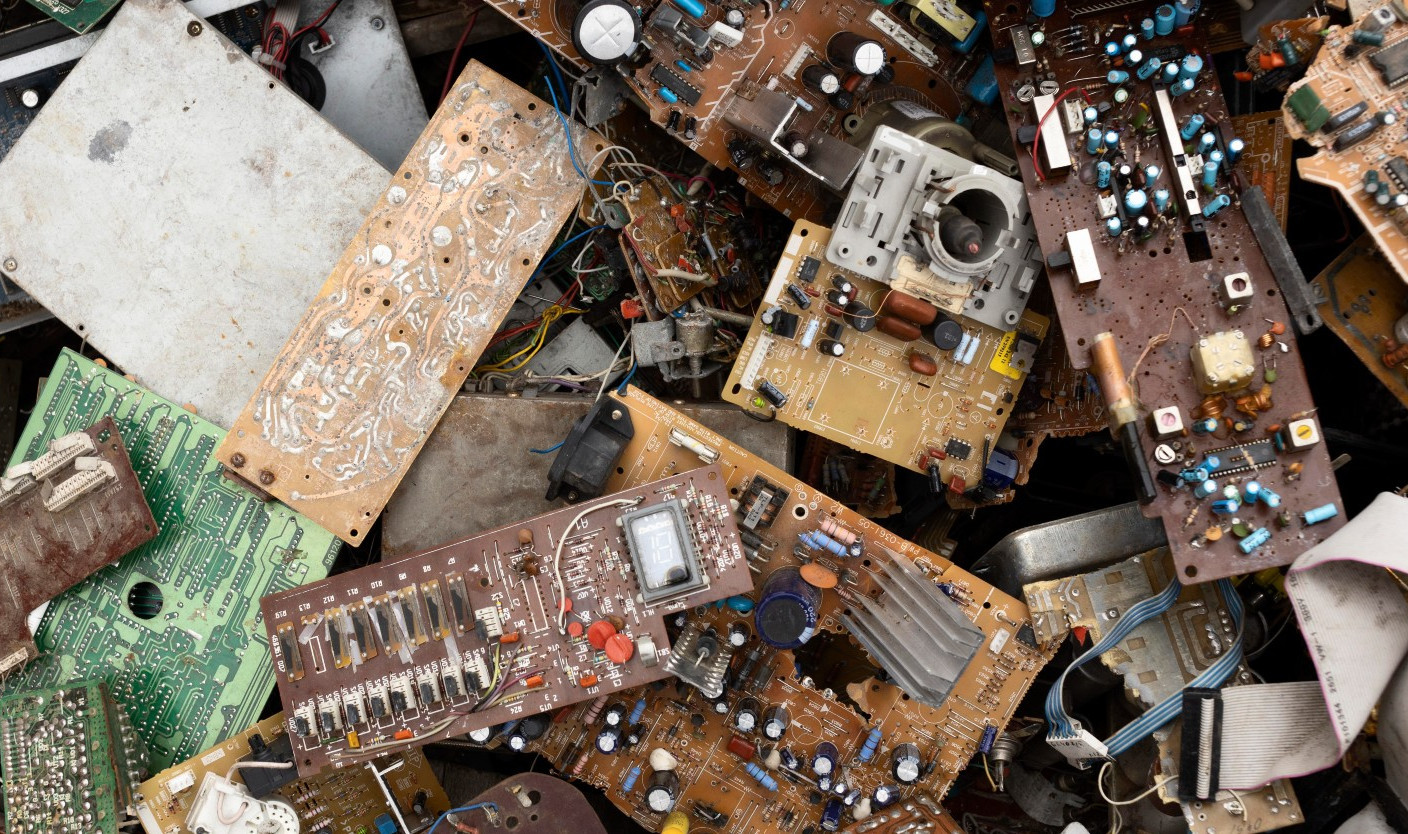 Stacks of non-metallic scrap metals like copper and aluminum in a recycling plant.